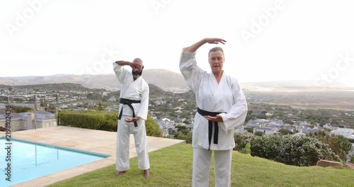Lifestyle videos outdoor of people doing activities, practicing martial arts, two people in karate u