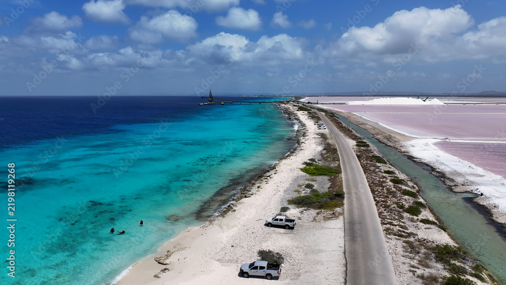 Obraz premium Salt Pier At Kralendijk In Bonaire Netherlands Antilles. Island Beach. Blue Sea Landscape. Kralendijk At Bonaire Netherlands Antilles. Tourism Background. Nature Seascape.