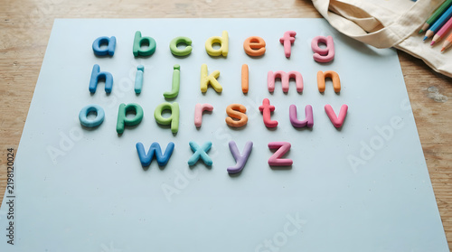 Colorful Alphabet Letters on Light Blue Background for Educational Use