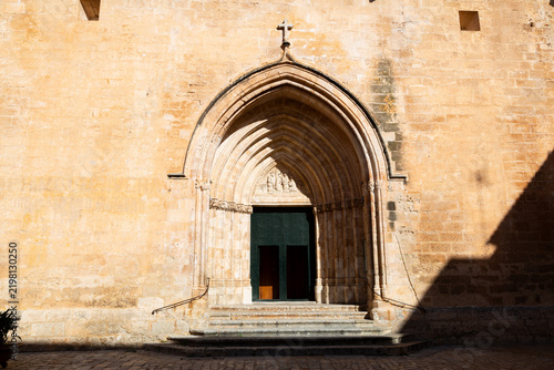 Ciutadella de menorca cathedral facade and rose window under blue sky