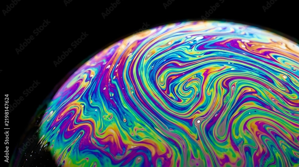 Obraz premium Iridescent soap bubble surface displays swirling rainbow colors with intricate fluid patterns captured in a vibrant macro photography style shot