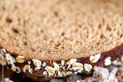 Bild auf Leinwand Whole grain bread slice closeup.