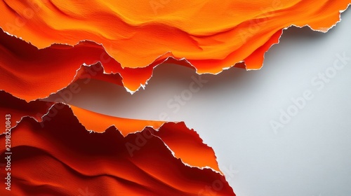 Bold textured orange waves reveal smooth gray beneath in an artful design
