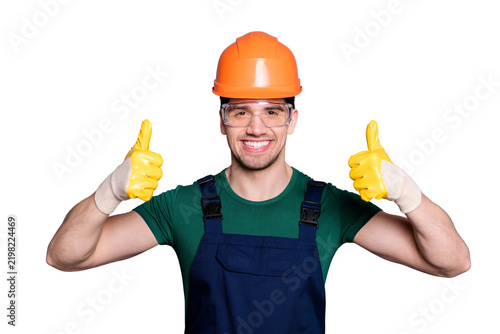 Obraz na plátně Portrait of confident cool repairer man have orange hard hat yellow gloves show