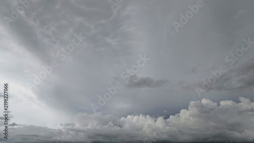 Dramatic Cloudy Sky Over Calm Lake Water Landscape