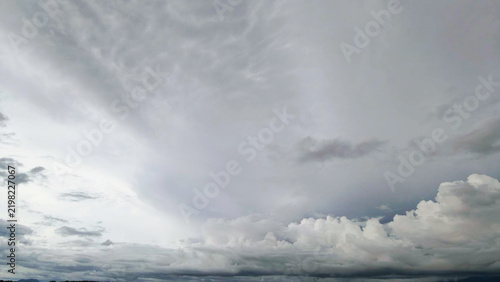 Dramatic Cloudy Sky Over Calm Lake Water Landscape