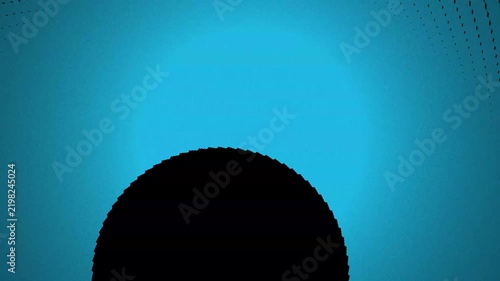 Abstract minimalist background featuring a dark circular shape centered against a glowing cyan blue gradient surface