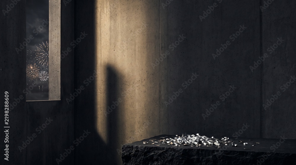 Obraz premium Minimalist dark concrete interior with scattering crystals on stone platform illuminated by moody warm window light