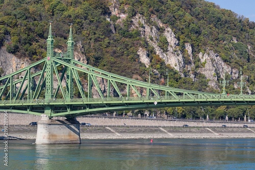 Liberty Bridge spans across the river in Budapest, Hungary.
