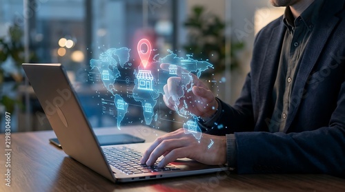Businessman using laptop with global store locator and digital map technology interface for international retail expansion and e commerce strategy
