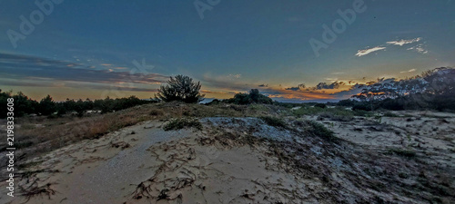Sunset over the sambaqui dunes in arroio do sal , brazil
