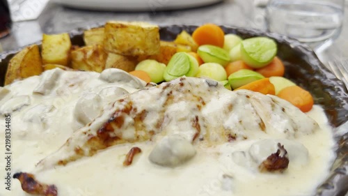Gourmet Chicken Breast with Mushroom Sauce and Vegetable Garnish