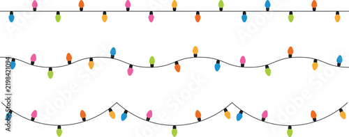 Colorful christmas lights string with multiple bulbs isolated on transparent background