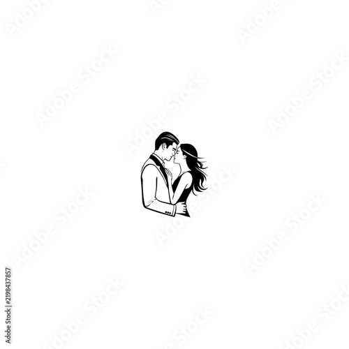 Silhouette of a Passionate Couple Embracing and Kissing.