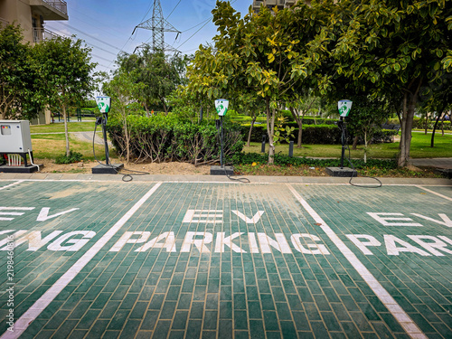 Dedicated EV parking bays with charging stations in Delhi, highlighting electric mobility, clean transportation, and India's growing EV infrastructure and focus