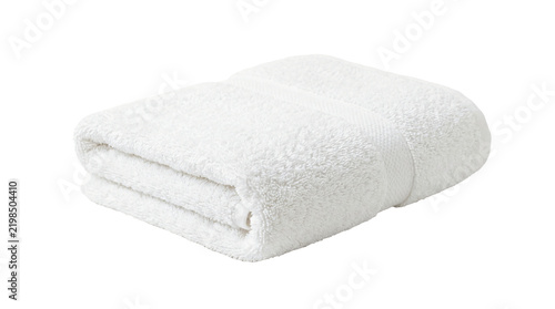 White folded towel made of soft cotton fabric lying flat isolated on transparent background