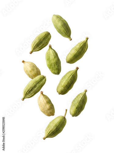 Levitating green cardamom pods isolated on a pure transparent background in a dynamic floating composition for culinary concepts, product photography, and food styling design layouts.