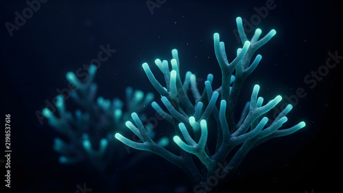 Glowing cyan coral branches in dark deep sea water, bioluminescent marine organism with light emitting tips, underwater nature