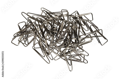 Metal paper clips scattered pile shiny surface office stationery