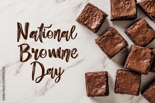 National Brownie Day chocolate brownies on marble background