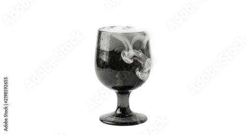 Obraz na plátně A dark glass goblet filled with a mysterious smoking liquid against a clean whit