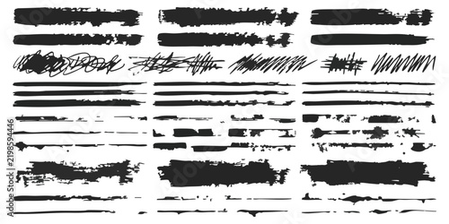 Set of black ink brush strokes and messy hand drawn lines for artistic creative design and graphic projects