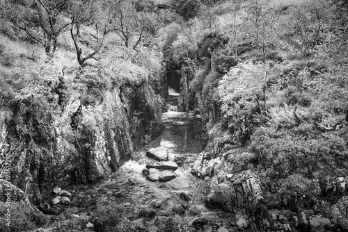 Waterfall on River Coe during autumn at Glencoe National Nature Reserve in Ballachulish, Scotland, UK