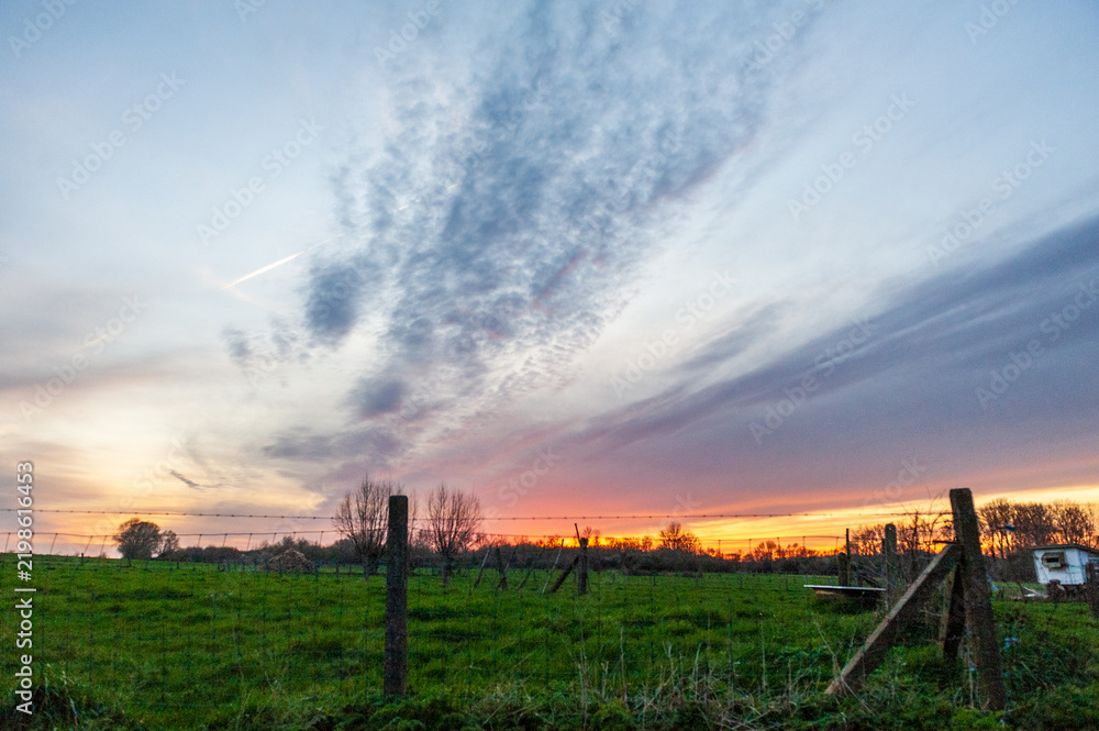 Fototapeta premium Close-up of a stunningly beautiful sunset in east flanders.