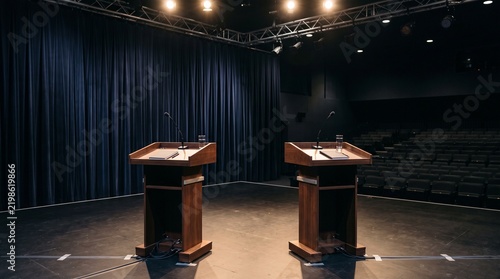 Empty Debate Stage with Two Lecterns and Audience Seating