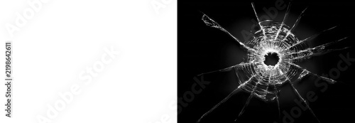 Shattered glass hole with radial cracks isolated on transparent background