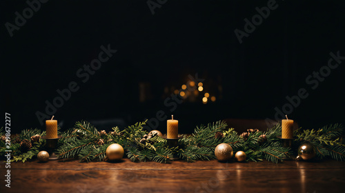 Christmas garland with candles and ornaments