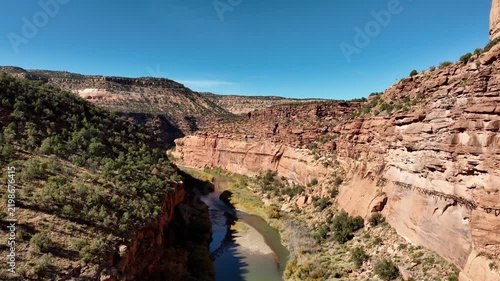 Aerial of the remains of the Hanging Flume water chute built in the Dolores River Canyon in Colorado. The flume was built in the 1880’s to transport water for gold mining.