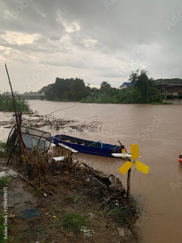 The river overflows on rainy days. and have boats on the river