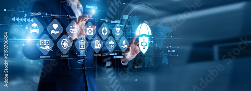 Fotografie Risk assessor touch virtual screen reviewing policyholder claims and complex actuarial probability charts