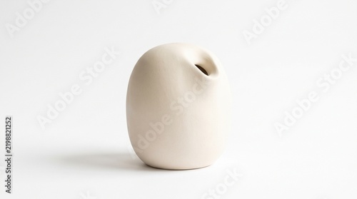 Title: Minimal white aroma diffuser isolated on white background representing home fragrance, aromatherapy, relaxation, wellness, modern interior decor, and elegant lifestyle product presentation