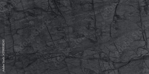 Dark charcoal grey marble stone texture with fine white and grey veins dark grey