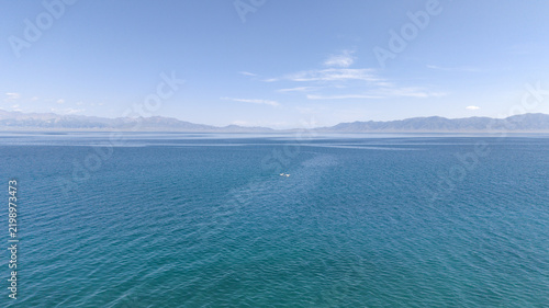 Konstfotografi Serene panorama of swans on Sayram Lake in Xinjiang, China