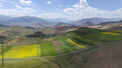 Colorful Farmland and Rolling Hills at Zhuoer Mountain, Qilian, Qinghai, China