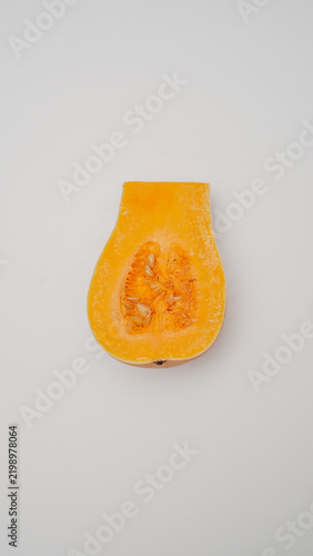 Halved butternut squash with seeds