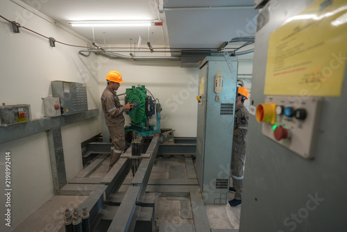 Принти на полотні Industrial technician maintenance machinery electrical panel control room, worke