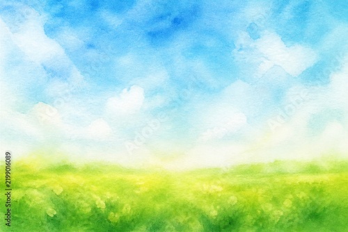 Green meadow stretching under bright watercolor sky