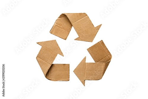 Handmade recycling symbol crafted from folded brown corrugated cardboard, isolated on a clean white background, representing sustainable packaging, waste reduction, reuse, and environmental 