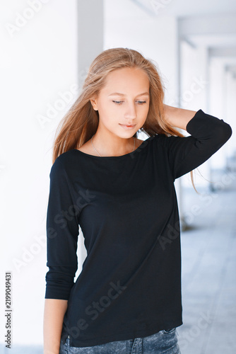 Beautiful girl on the background of columns
