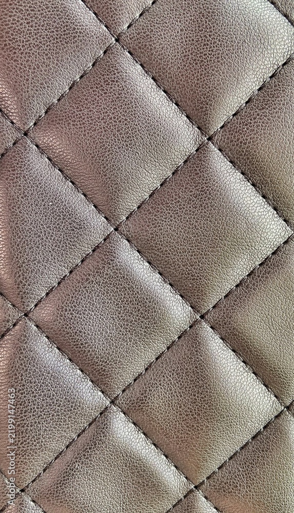 Obraz premium Brown Quilted Upholstery Texture