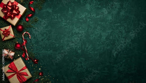Christmas Decorations With Presents, Ornaments, and Candy Canes on Green Back...