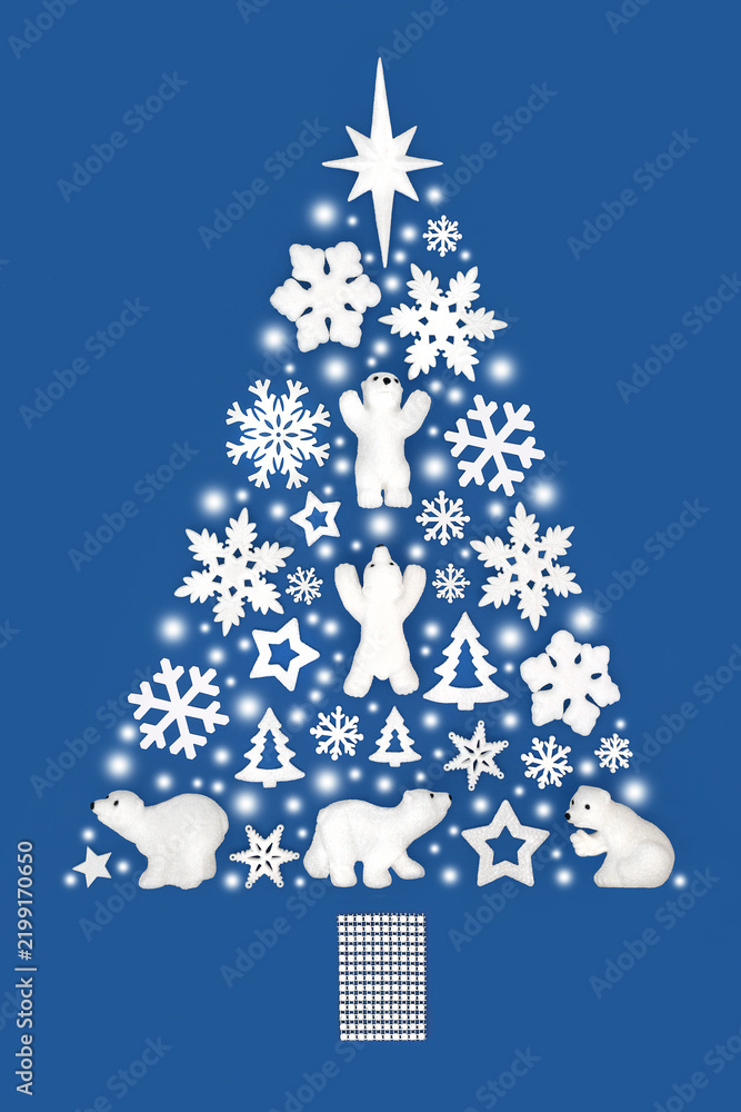 Obraz premium Christmas tree abstract with white decorations of polar bears, snowflakes, stars, trees, symbolic snow. North Pole cold theme concept on blue for greeting card.