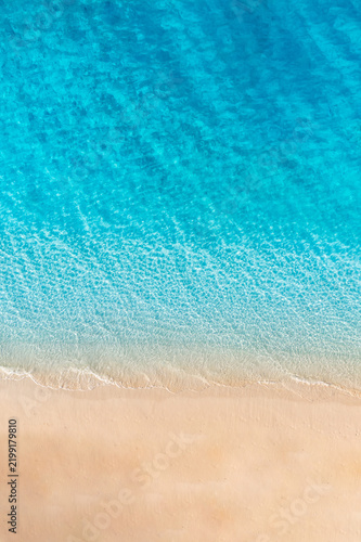 Perfect aerial turquoise ocean crystal water golden sand beach shoreline abstract minimal summer paradise. Peaceful nature seascape design scene. Artistic drone coastal pattern relax wellness wall art