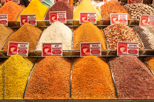 Colorful spices and seasonings displayed for sale at a traditional shop in the Grand Bazaar (Kapali Carsi) in Istanbul, Turkey
