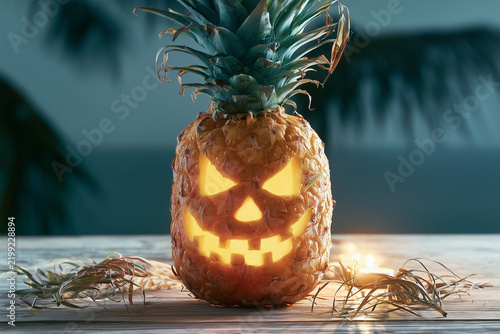 Pineapple carved as a jack-o-lantern with glowing face