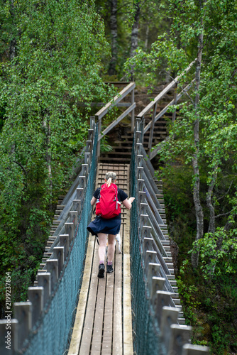 Woman hiking in Lapland Finland